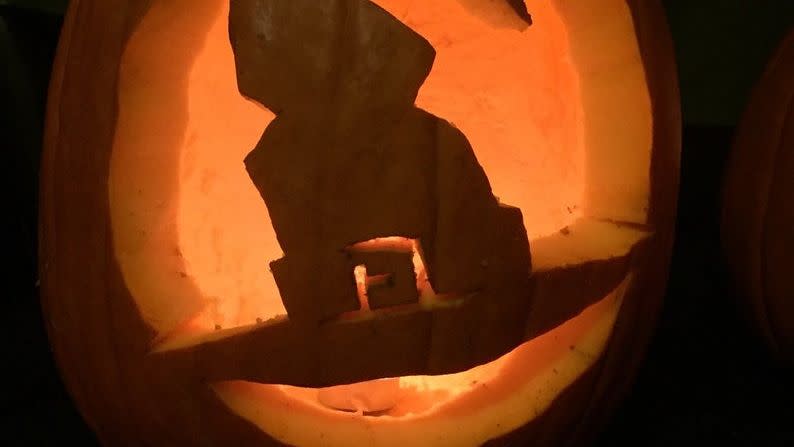 hat carved into pumpkin