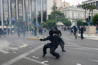 <p>A protester reacts as minor clashes with police break out during an anti-austerity demonstration in central Athens, Greece on May 17, 2016. Greek labor unions called for a 24-hour general strike against austerity cuts debated in Parliament. (Gerasimos Koilakos/NurPhoto via Getty Images) </p>