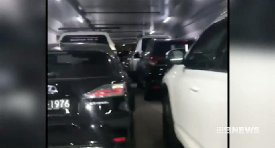 Dozens of cars trapped in the Sydney Opera House underground car park following Vivid festival road closures. Source: Nine News