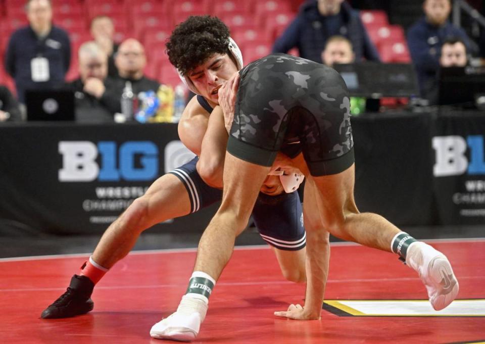 Penn State’s Beau Bartlett wrestles Michigan State’s Jordan Hamdan in a 141 lb quarterfinal match of the Big Ten Wresting Championships at the Xfinity Center at the University of Maryland on Saturday, March 9, 2024.