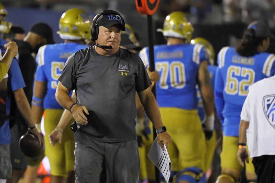 FILE - In this Sept. 14, 2019 file photo, UCLA coach Chip Kelly stands on the sideline during the second half of an NCAA college football game against Oklahoma. in Pasadena, Calif. Kelly is entering his third year in charge but has only seven wins in his first two seasons (AP Photo/Mark J. Terrill, File)