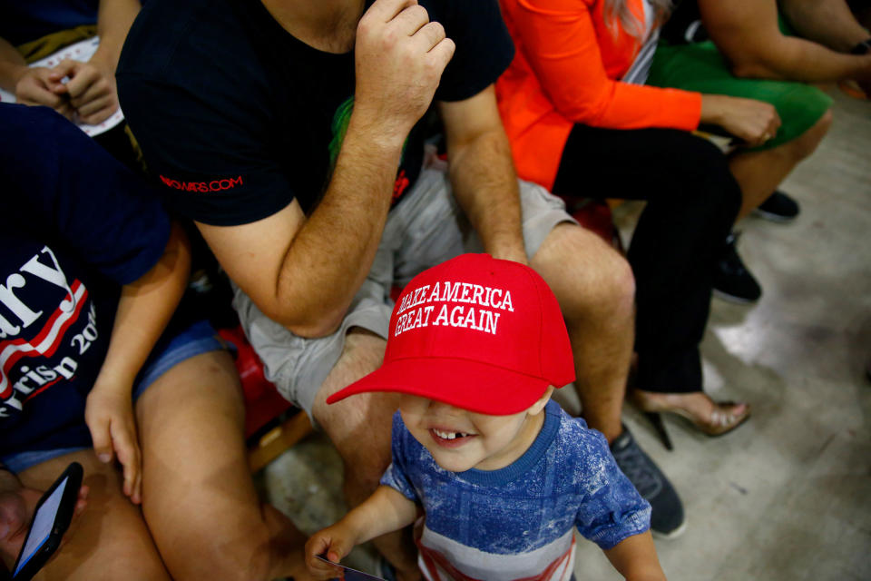 Toddler in a Trump cap