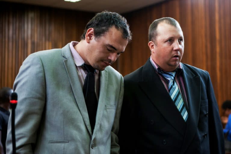 Willem Oosthuizen, left, and Theo Jackson filmed themselves forcing a black man into a coffin and threatening to burn him alive