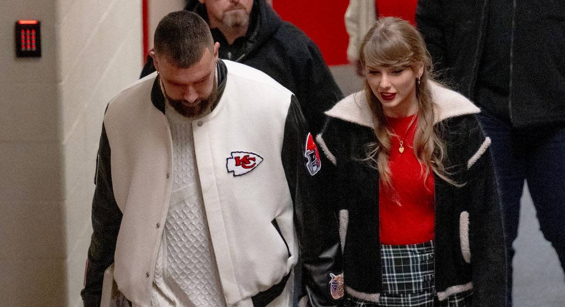 Pop star Taylor Swift holds hands with boyfriend and Chiefs tight end Travis Kelce as they left GEHA Field at Arrowhead Stadium after an NFL football game on Monday, Dec. 25, 2023, in Kansas City.