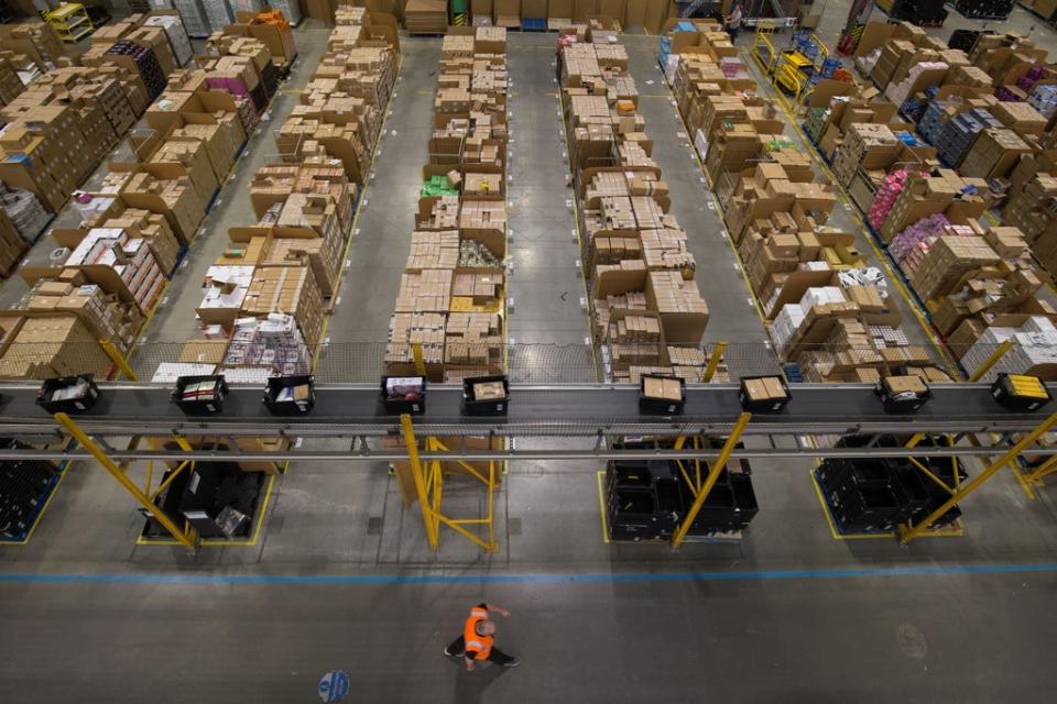 Parcels are processed and prepared for dispatch at Amazon’s Fulfilment Centre at Kingston Park in Peterborough (Aaron Chown/PA) (PA Wire)