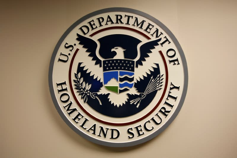 FILE PHOTO: U.S. Department of Homeland Security emblem is pictured at the National Cybersecurity & Communications Integration Center (NCCIC) located just outside Washington in Arlington, Virginia September 24, 2010. REUTERS/Hyungwon Kang/File Photo