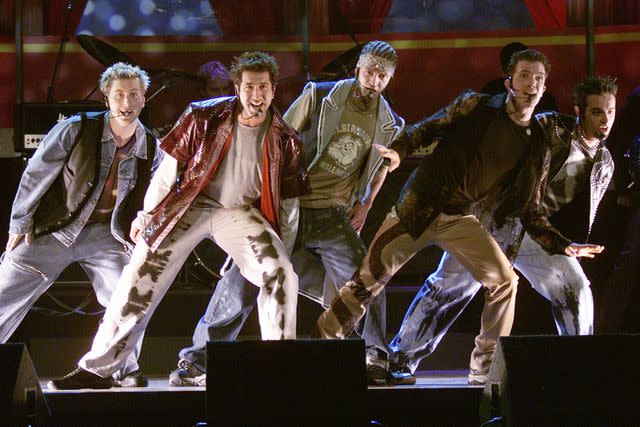 <p>Frank Micelotta/ImageDirect</p> JC Chasez performs alongside *NSYNC at the 2000 MTV Movie Awards