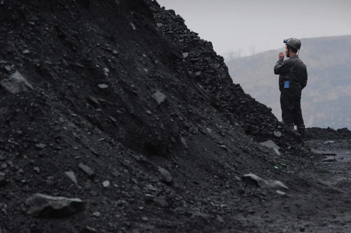 China's coal industry has been particularly hard hit as the country's growth slows (AFP Photo/Peter Parks)
