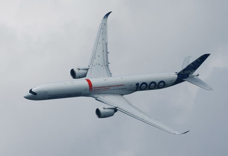FILE PHOTO: An Airbus A350-1000 flies during an aerial display at the Singapore Airshow at Changi Exhibition Centre
