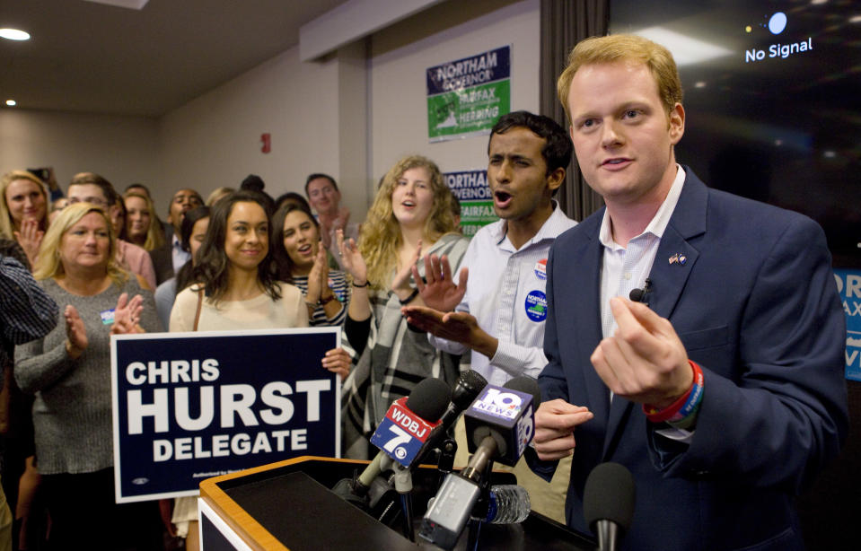 Democrat Chris Hurst, right, defeated Republican incumbent Joseph Yost to win House District 12 on Tuesday, Nov. 7, 2017, in Blacksburg, Va. Hurst celebrates with a packed room of supporters at The Hyatt Place in Blacksburg. (Photo: Heather Rousseau/The Roanoke Times via AP)