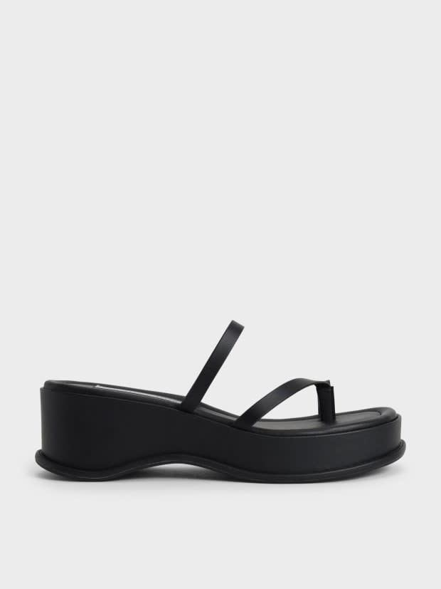 <p>Charles & Keith Toe Loop Flatform Sandals, $56, <a href="https://rstyle.me/+MpTufPWQvh7HdriJ8aZRmQ" rel="nofollow noopener" target="_blank" data-ylk="slk:available here;elm:context_link;itc:0;sec:content-canvas" class="link ">available here</a>. </p>