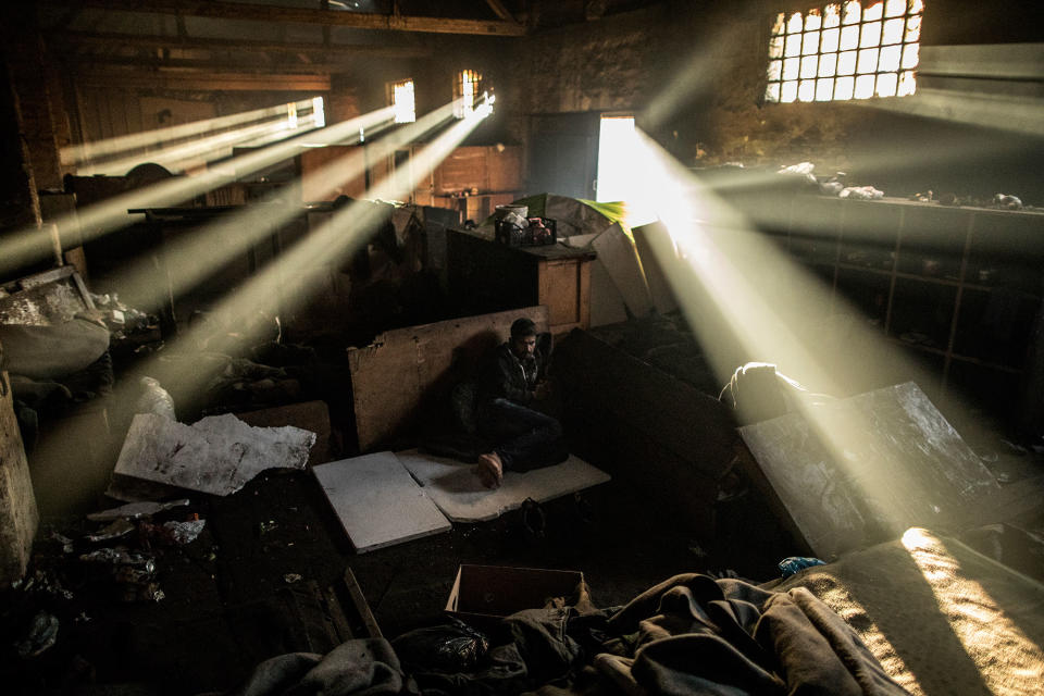 <p>A Pakistani migrant is seen inside an abandoned warehouse near the Central train station in Belgrade, Serbia, Feb. 1, 2017. (Manu Brabo/MeMo) </p>