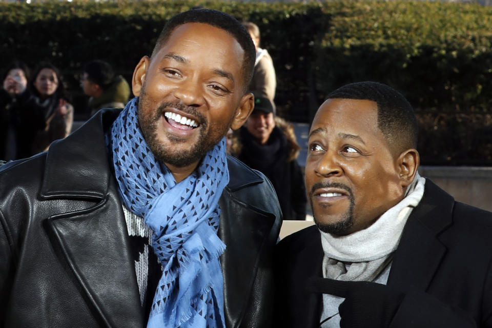 U.S actors Will Smith, left, and Martin Lawrence pose for photographers during the photocall of Â«Â Bad Boys for LifeÂ Â», in Paris, Monday, Jan. 6, 2020. (AP Photo/Thibault Camus)