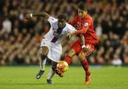 Football - Liverpool v Crystal Palace - Barclays Premier League - Anfield - 8/11/15 Liverpool's Roberto Firmino in action with Crystal Palace's Wilfried Zaha Action Images via Reuters / Lee Smith