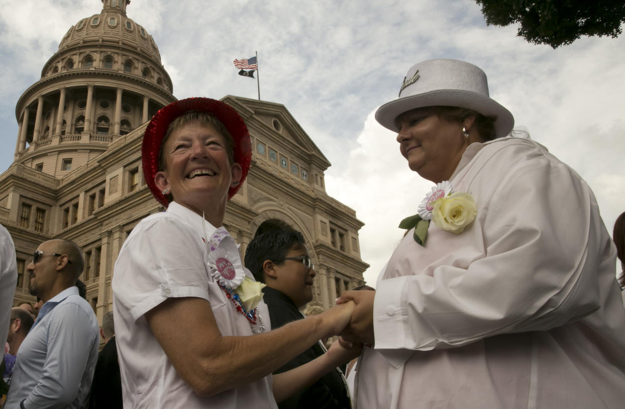 A week following the 2015 US Supreme Court decision legalizing same-sex marriage in the US, dozens of couples were married during a mass wedding ceremony on lawn of the Texas Capitol building. (Photo: Robert Daemmrich Photography Inc/Corbis via Getty Images)