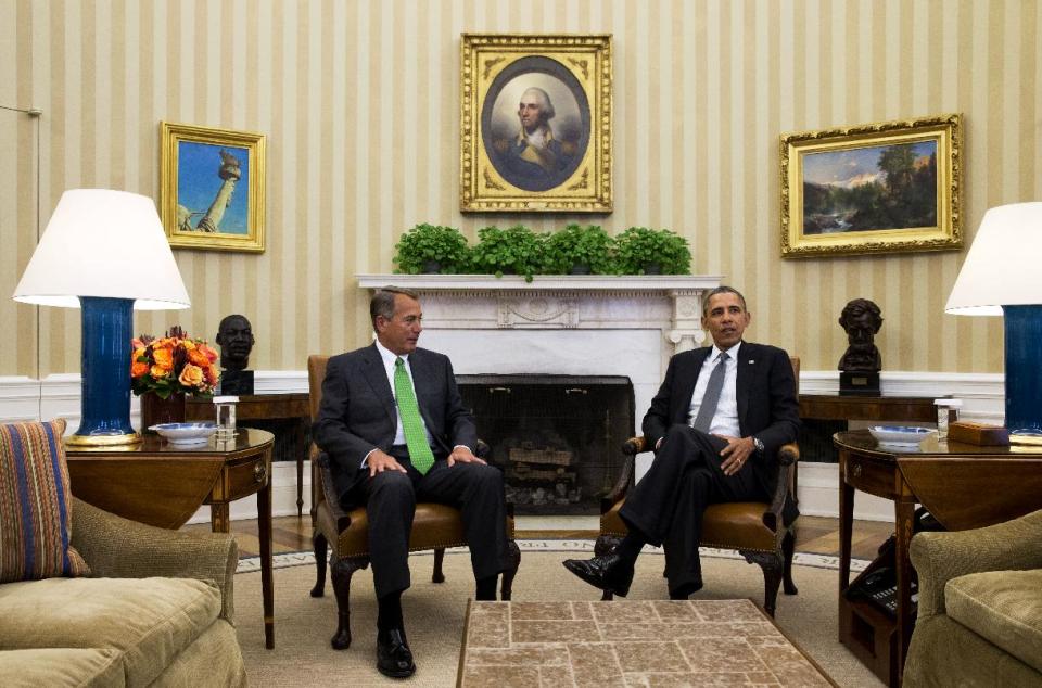 President Barack Obama meets with House Speaker John Boehner of Ohio in the Oval Office of the White House in Washington, Tuesday, Feb. 25, 2014. The Democratic president and Republican speaker met in the Oval Office, their first meeting alone at the White House since December 2012, when they failed to reach agreement on tax reform and spending cuts during deficit-reduction talks. (AP Photo/Jacquelyn Martin)