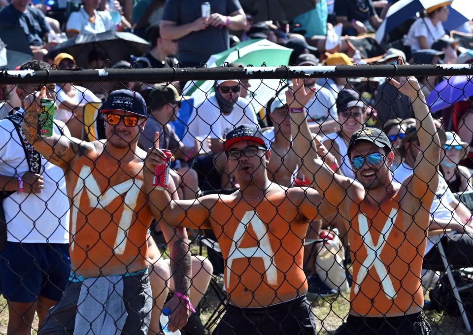 Fans of Red Bull's Dutch driver Max Verstappen wait for the start of the Formula One United States Grand Prix at the Circuit of The Americas in Austin, Texas