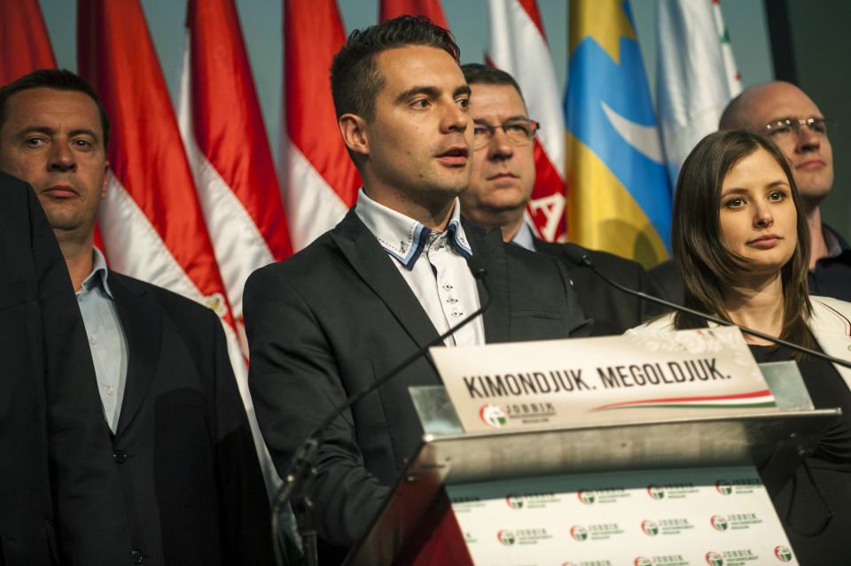 Chairman of the radical nationalist Jobbik party Gabor Vona, center, delivers his speech after the parliamentary elections in the Budapest Congress Centre in Budapest, Hungary, late Sunday, April 6, 2014. (AP Photo/MTI, Janos Marjai)