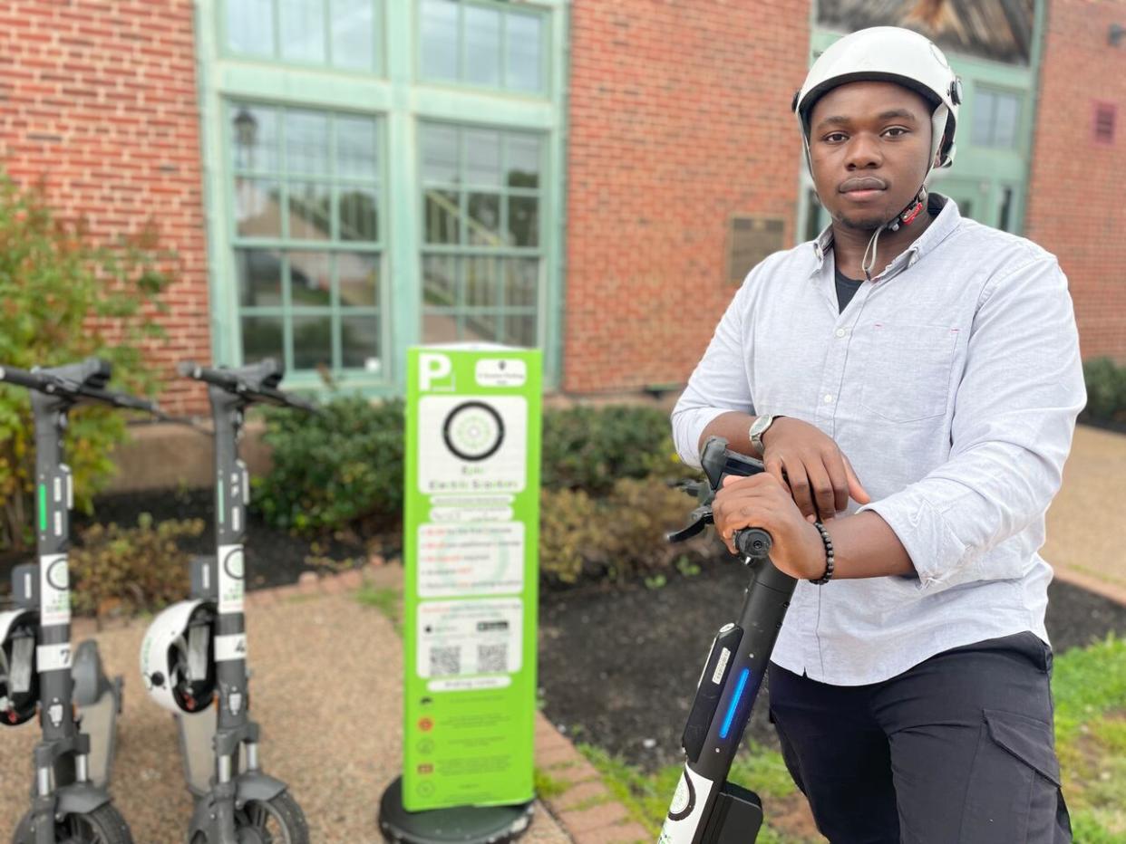 Tafadzwa Mpaso, the owner of Epic Electric Scooters, has put in a variety of security measures to ensure safety. (Steve Bruce/CBC News - image credit)