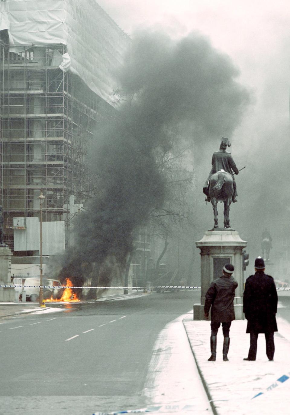 A white van burns outside the Banqueting House in Whitehall after an attempted mortar bomb attack on Downing Street (PA) (PA Archive)