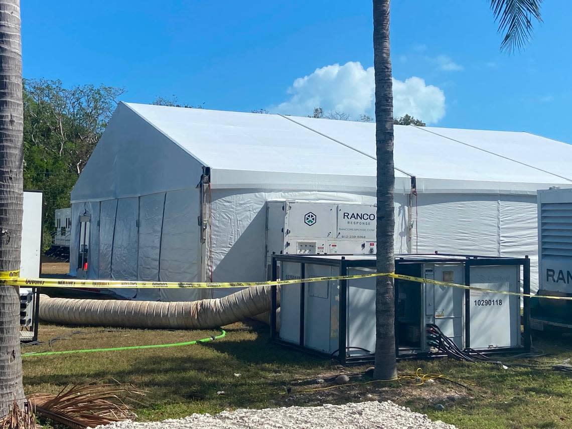 A large, air-conditioned tent is erected on a residential lot on Plantation Key, located within the Village of Islamorada in the Florida Keys, Thursday, Feb. 16, 2023. It’s part of a state base camp to house police officers sent to the Keys to help with an increase in maritime migration from Cuba and Haiti, according to a statement from the Village of Islamorada.