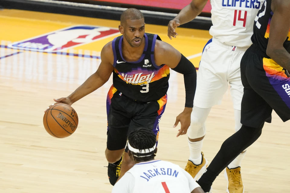 Phoenix Suns guard Chris Paul (3) looks to pass against the Los Angeles Clippers during the first half of game 5 of the NBA basketball Western Conference Finals, Monday, June 28, 2021, in Phoenix. (AP Photo/Matt York)