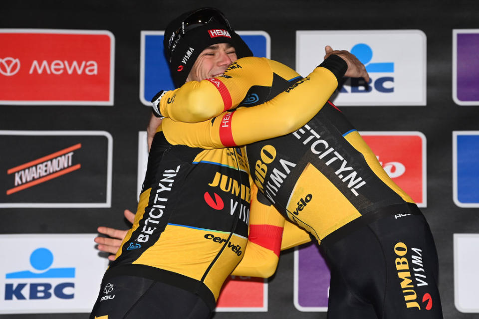 WEVELGEM BELGIUM  MARCH 26 LR The second classified Wout Van Aert of Belgium and race winner Christophe Laporte of France and Team JumboVisma congratulate each other at podium during the 85th GentWevelgem in Flanders Fields 2023 Mens Elite a 2609km one day race from Ypres to Wevelgem  UCIWT  on March 26 2023 in Wevelgem Belgium Photo by Tim de WaeleGetty Images