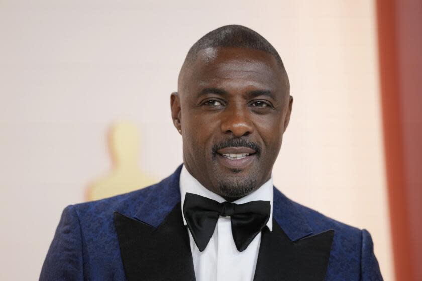 Idris Elba arrives at the Oscars on Sunday, March 12, 2023, at the Dolby Theatre in Los Angeles. (AP Photo/Ashley Landis)
