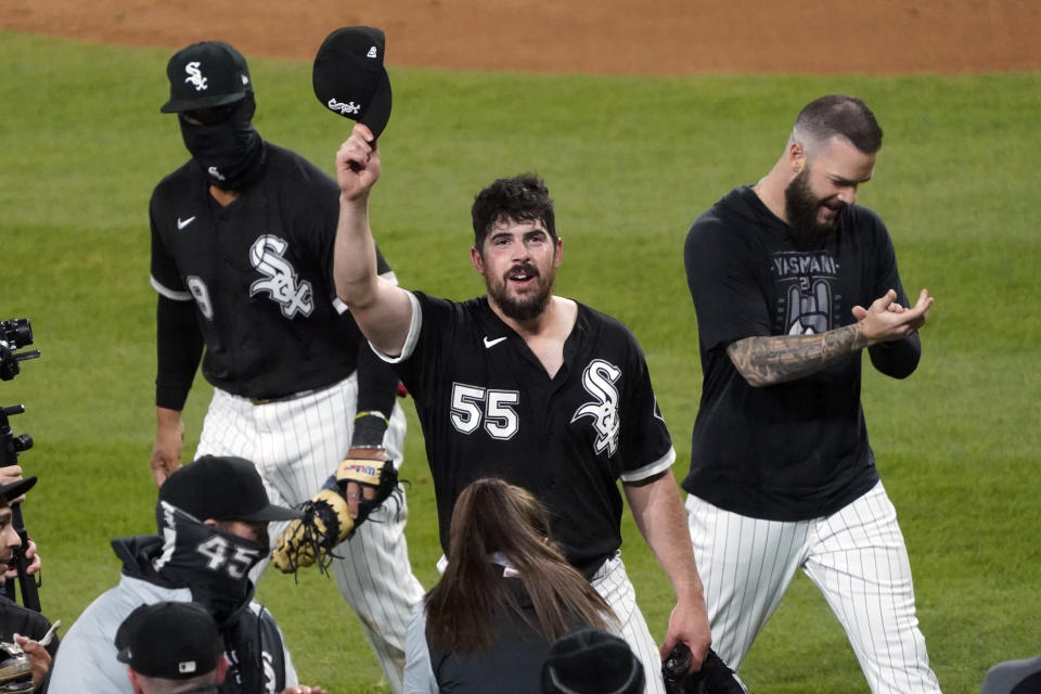 Chicago White Sox starting pitcher Carlos Rodon (55) celebrates his no hitter against the Cleveland Indians with his teammates in a baseball game, Wednesday, April, 14, 2021, in Chicago. (AP Photo/David Banks)