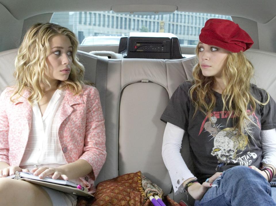 Mary-Kate and Ashley Olsen in a car