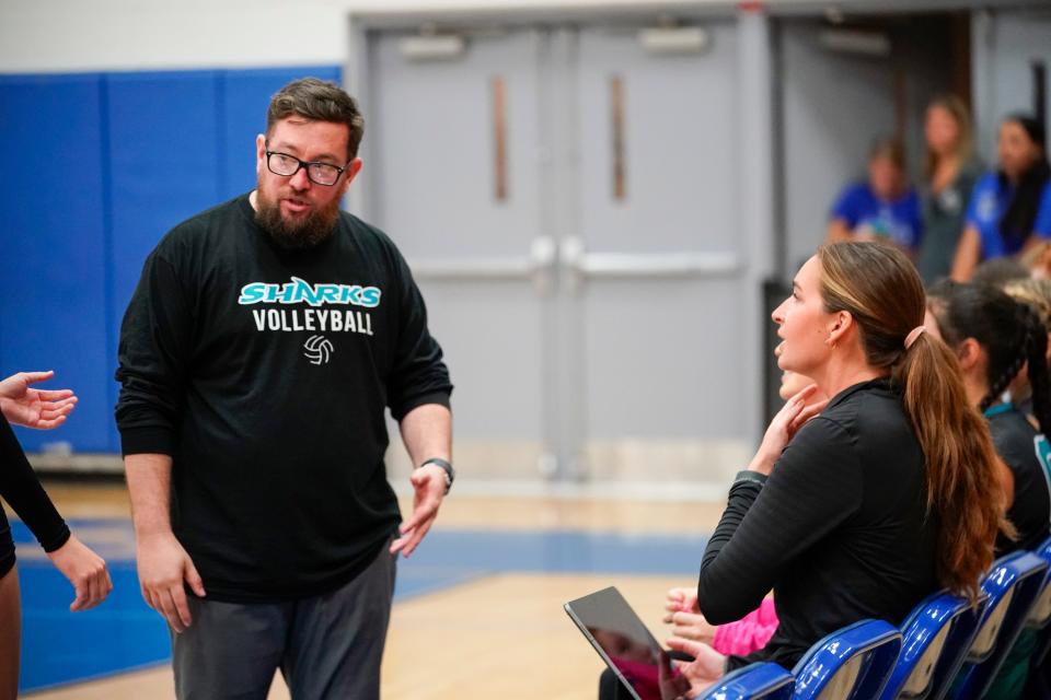 Gulf Coast coach John Alvarez (left) looks on with assistant coach Snowy Stokes (right) in the CCAC Championship game against Barron Collier on Thursday, Oct. 5, 2023.