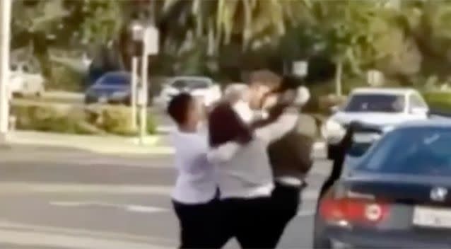 PICTURED: A group of people caught in a road rage fight. Photo: Channel 7