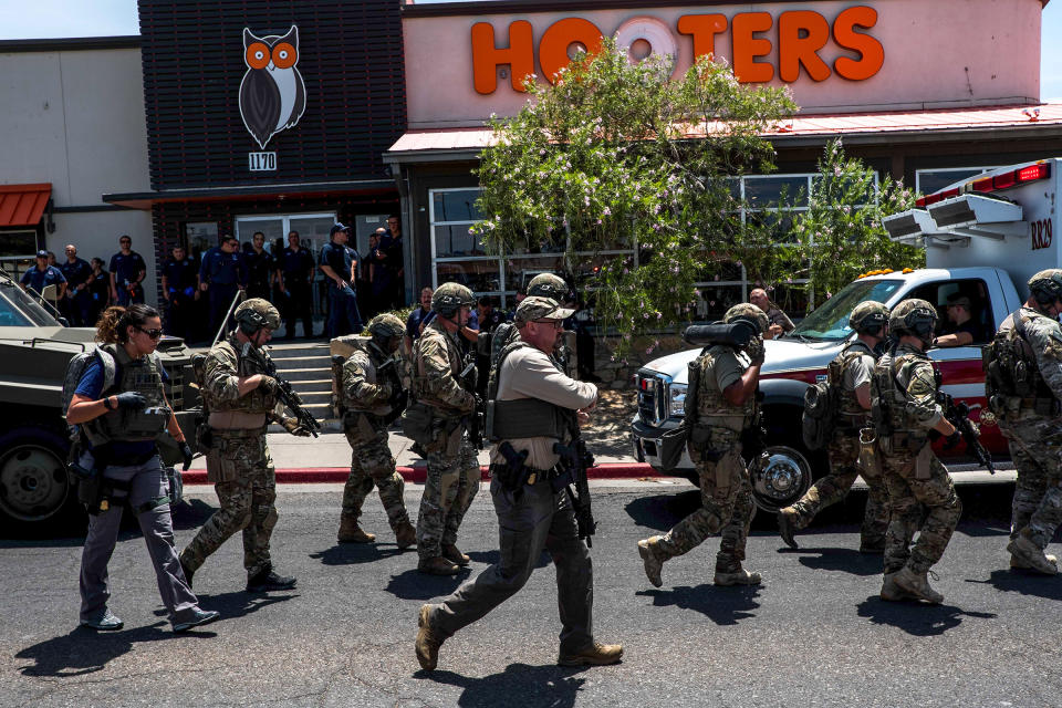 Law enforcement agencies respond to an active shooter at a Wal-Mart near Cielo Vista Mall in El Paso, Texas, Saturday, Aug. 3, 2019. - Police said there may be more than one suspect involved in an active shooter situation Saturday in El Paso, Texas. City police said on Twitter they had received "multi reports of multipe shooters." There was no immediate word on casualties.<span class="copyright">Joel Angel—AFP/Getty Images</span>