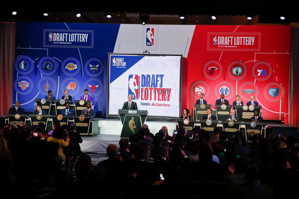 NBA Deputy Commissioner Mark Tatum gets ready to announce the order of the picks during the NBA basketball draft lottery May 14, 2019, in Chicago.