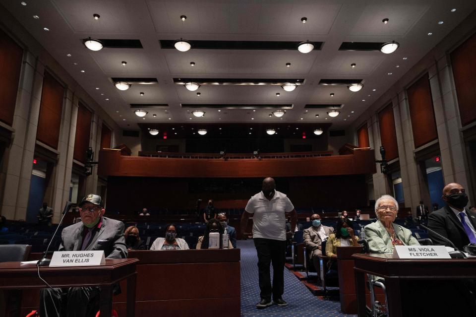 Hughes Van Ellis, left, a Tulsa Race Massacre survivor and World War II veteran, and Viola Fletcher, Ellis' sister, testify on Capitol Hill in Washington, D.C., on May 19, 2021.