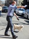 <p>Christopher Meloni is seen with a furry friend while filming <i>Law and Order: Organized Crime</i> on Tuesday in N.Y.C. </p>