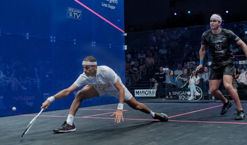 Singapore Squash Open men's champion Mohamed ElShorbagy of England (left) in action against Peru's Diego Elias in the men's final. (PHOTO: Marigold Singapore Squash Open)