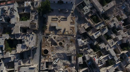 A still image from video taken October 12, 2016 of a general view of the bomb-damaged Old City area of Aleppo, Syria. REUTERS/via Reuters TV