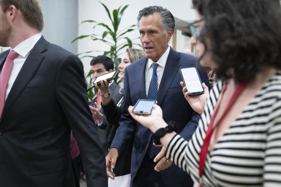 Sen. Mitt Romney, R-Utah,speaks to reporters after attending a closed door briefing about leaked highly classified military documents, Wednesday, April 19, 2023, on Capitol Hill in Washington. (AP Photo/Jacquelyn Martin)