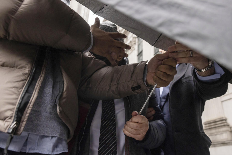 Joe Lewis leaves Manhattan Federal court, Wednesday, Jan. 24, 2024, in New York. Lewis pleaded guilty Wednesday to insider trading and conspiracy charges in New York, just six months after he was charged. Lewis’ family trust owns the Tottenham Hotspur soccer team. (AP Photo/Yuki Iwamura)