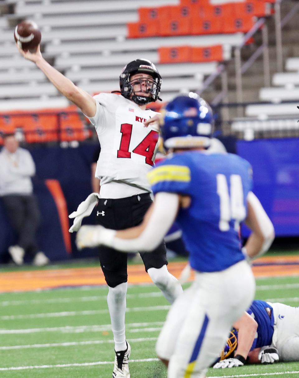 Rye's AJ Miller (14) passes against Maine-Endwell during the New York State Class B championship at the JMA Dome in Syracuse Dec. 3, 2023.