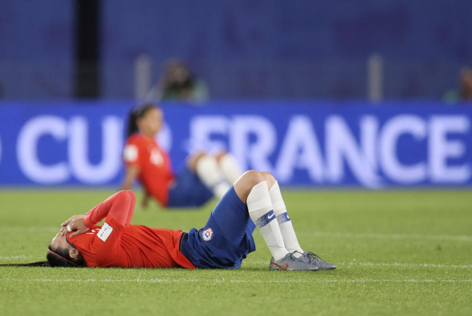 Chile players react at the end of the Women's World Cup Group F soccer match between Thailand and Chile at the Roazhon Park in Rennes, France, Thursday, June 20, 2019. Chile won 2-0, one goal short of the win by three goals difference needed to qualify for the next round. (AP Photo/David Vincent)