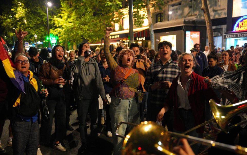 People celebrate in Place de la Republique