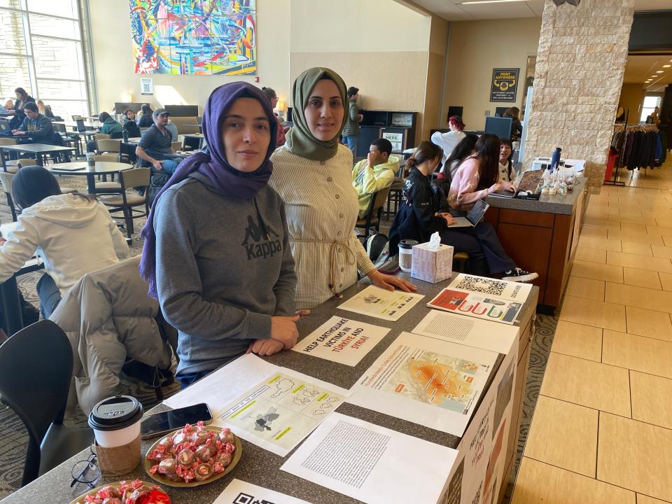 University of Missouri Turkish students Kübra Firat, left, and Feride Tanrikulu on Friday, Feb. 17, 2023, staff an information table in the MU Student Center about the earthquake affecting Turkey and Syria.