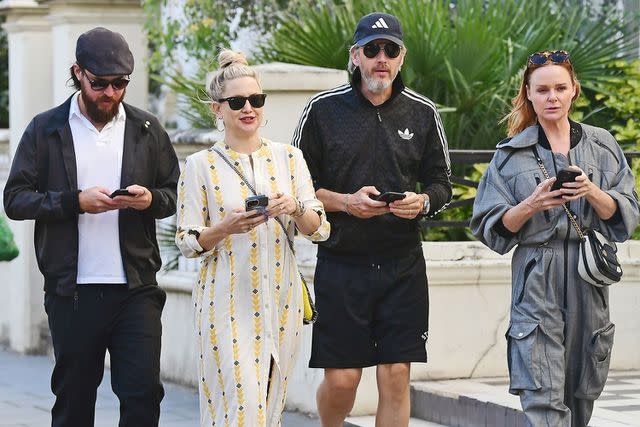 <p>backgrid</p> Kate Hudson, Stella McCartney, Danny Fujikawa, Alasdhair Willis in London