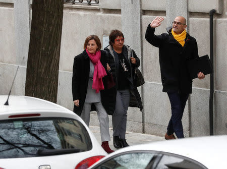 Catalan politicians (L-R) Carme Forcadell, Dolors Bassa and Raul Romeva arrive together to the Supreme Court after being summoned and facing investigation for their part in Catalonia's bid for independence in Madrid, Spain, March 23, 2018. REUTERS/Juan Medina