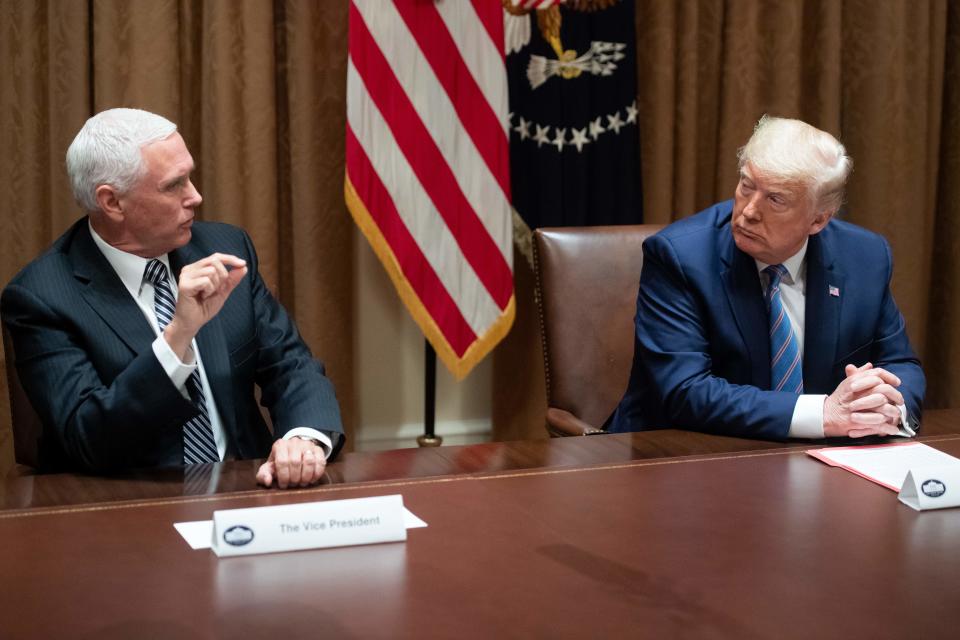 Vice President Mike Pence with US President Donald Trump speaks during a roundtable meeting on seniors in the Cabinet Room at the White House in Washington, DC, June 15, 2020. - President Donald Trump holds a roundtable discussion with senior citizens called Fighting for Americas Seniors on Monday. (Photo by SAUL LOEB / AFP) (Photo by SAUL LOEB/AFP via Getty Images)