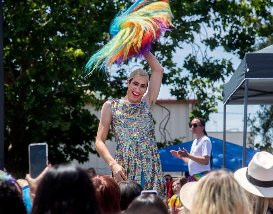 Drag performer Just Dharma doffs their wig during a performance at the Lodi Pride festival hosted by the nonprofit A New Lodi at High Water Brewing in Lodi. The festival included a drag hour, live entertainment, and even an activity corner with coloring and games for children. Hundreds of people attended the first ever event in Lodi.