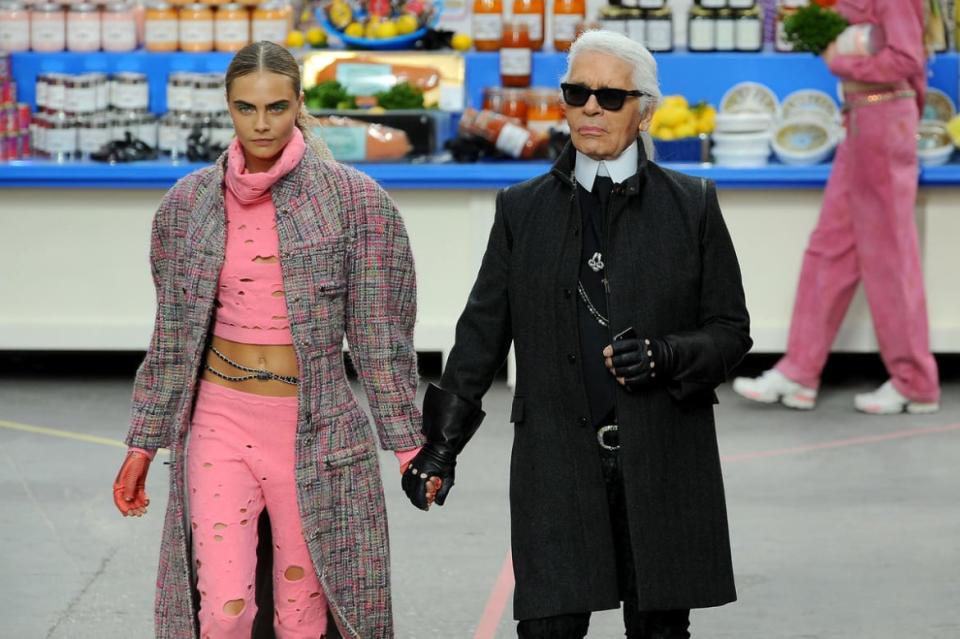<div class="inline-image__caption"><p>Karl Lagerfeld and model Cara Delevingne appear at the end of the runway during the Chanel show as part of the Paris Fashion Week Womenswear Fall/Winter 2014-2015 on March 4, 2014 in Paris, France.</p></div> <div class="inline-image__credit">Francois Durand/Getty Images</div>