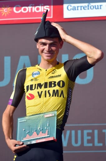 Sepp Kuss on the mountain top podium